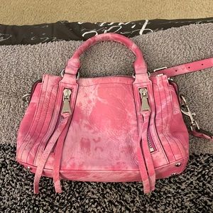 Pink purse with handles and long strap lots of pockets